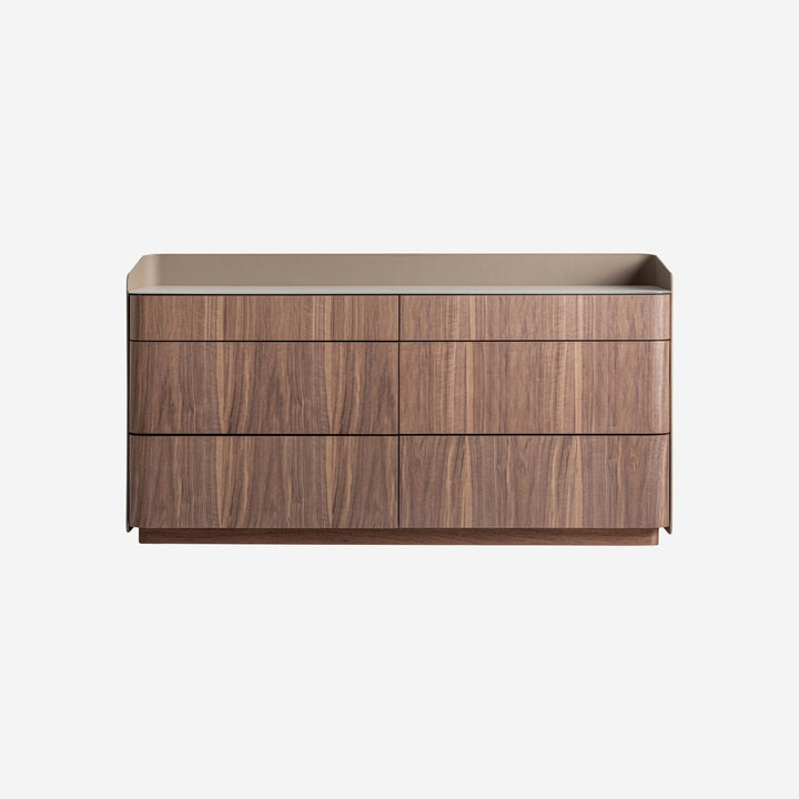 Cómoda de madera contrachapada y polipiel en color nogal