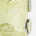 Jarrón de vidrio en color verde traslúcido cilíndrico con relieves – detalle