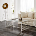 Mesa de centro rectangular de cristal plateada, 40 cm de alto en ambiente decorado