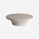 Mesa de centro de cemento en color beige