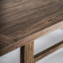 Mesa de comedor de madera de olmo en color marrón – detalle