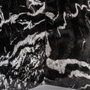 Mesa de comedor de mármol en color negro – detalle