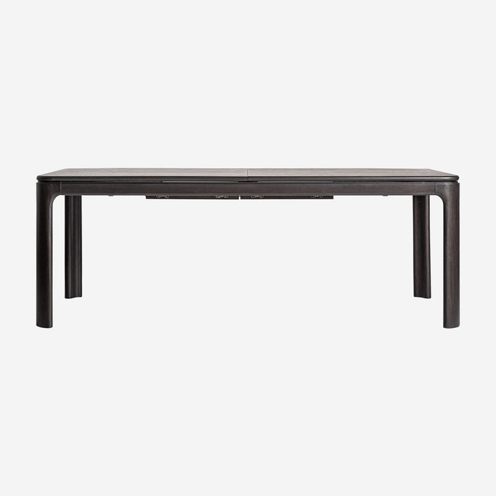 Mesa de comedor extensible de madera de fresno en color marrón lacado