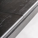 Mesa de comedor extensible de madera de fresno en color marrón lacado – detalle
