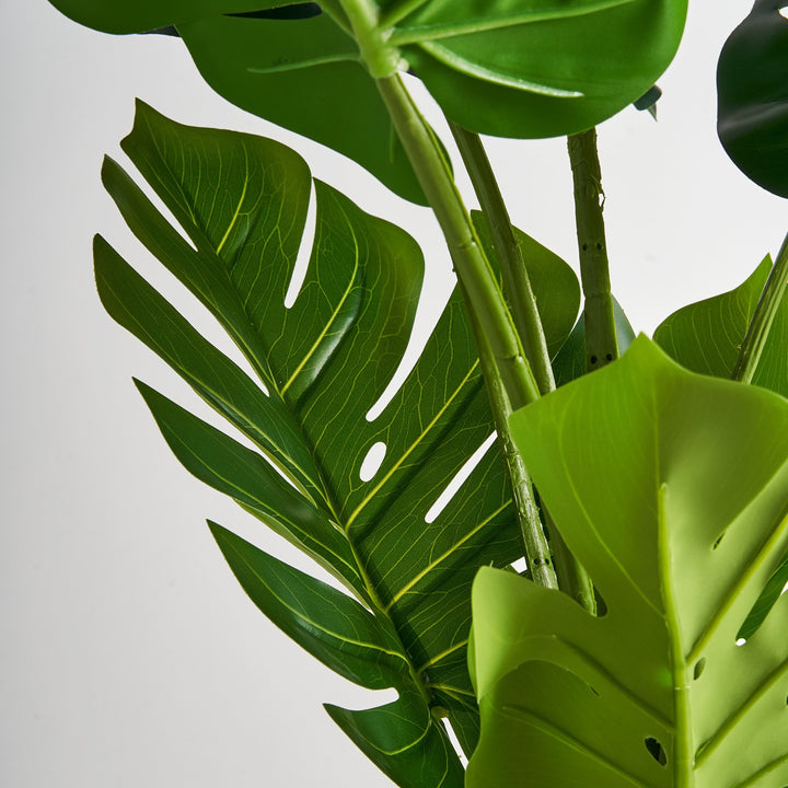 Planta artificial de poliéster en color verde 44 x 128 cm – detalle