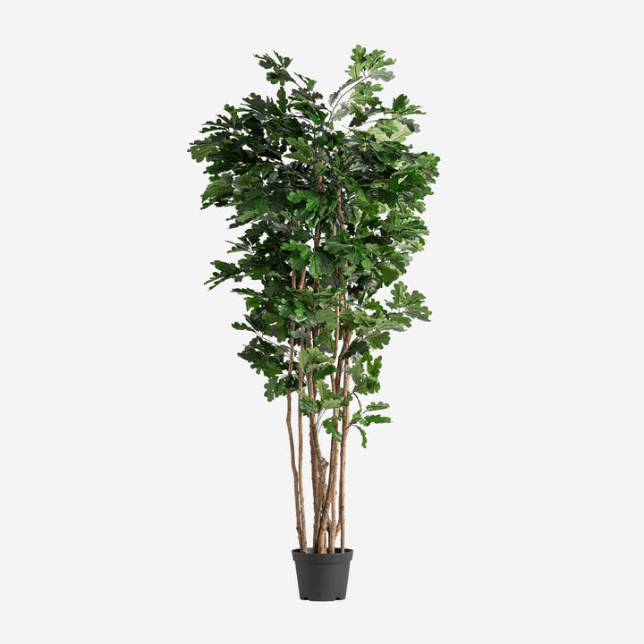Planta artificial de poliéster y polietileno en color verde 90 x 70 x 210 cm