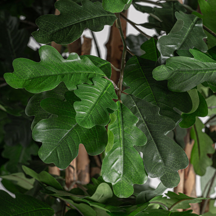 Planta artificial de poliéster y polietileno en color verde 90 x 70 x 210 cm – detalle