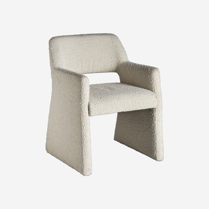 Silla de algodón bouclé y MDF en color blanco roto