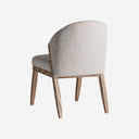 Silla de madera de pino y algodón bouclé en color marrón