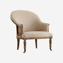Sillón de madera de fresno y loneta en color arena envejecido