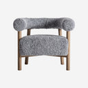 Sillón de madera de fresno y poliéster en color marrón natural