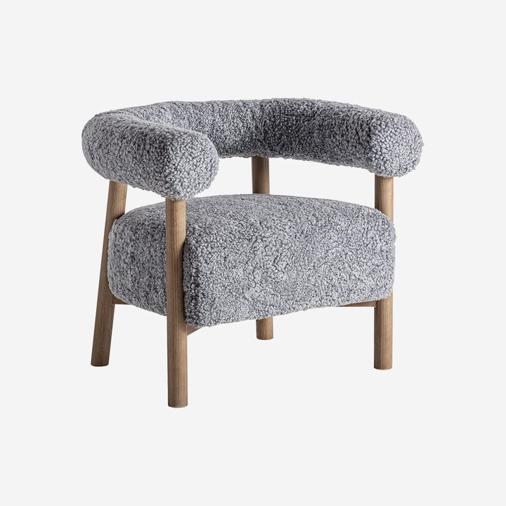 Sillón de madera de fresno y poliéster en color marrón natural