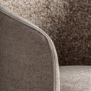 Sillón giratorio tapizado en poliéster en color beige – detalle
