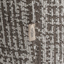 Sillón giratorio tapizado en poliéster en color gris jaspeado – detalle