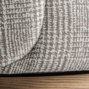 Sillón giratorio tapizado en poliéster en color gris jaspeado – detalle