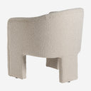 Sillón tapizado en algodón bouclé en color blanco roto