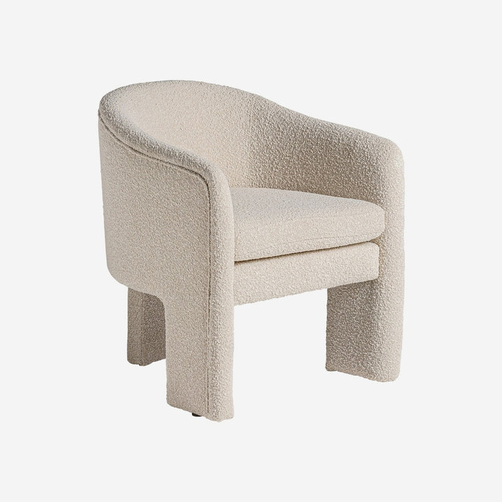 Sillón tapizado en algodón bouclé en color blanco roto