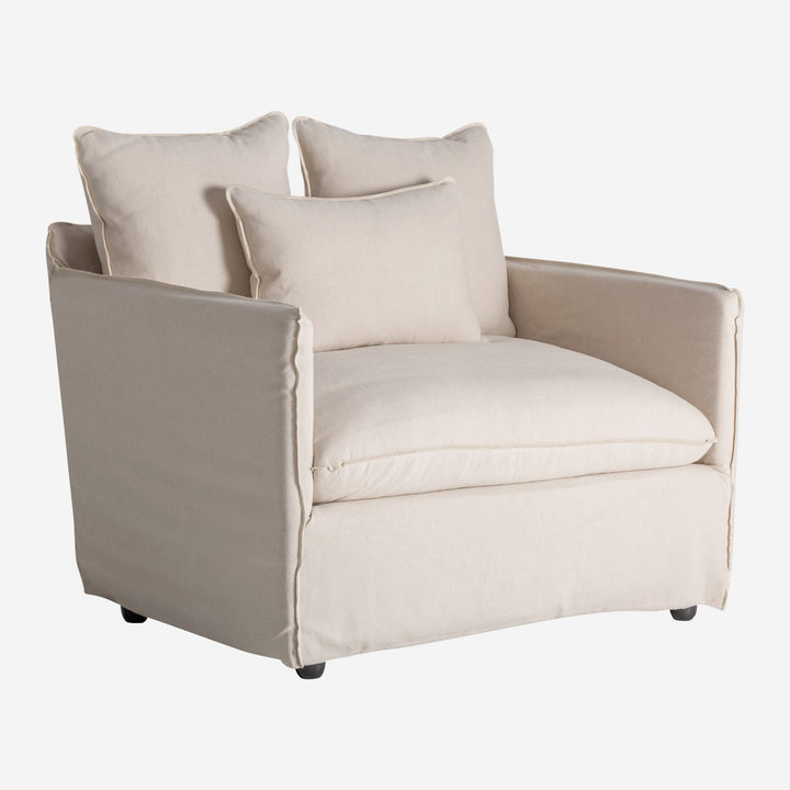 Sillón tapizado en lino en color beige