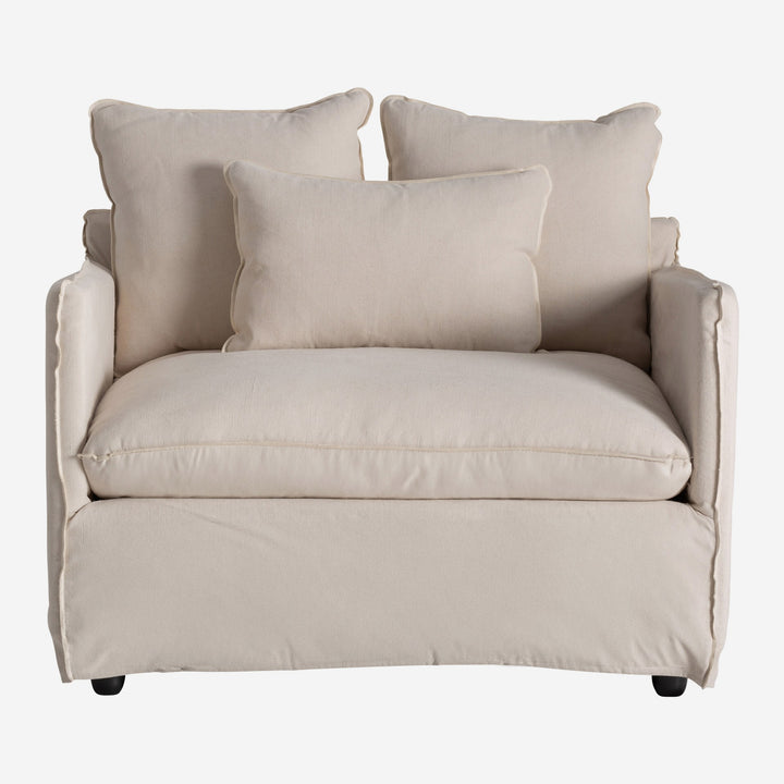 Sillón tapizado en lino en color beige