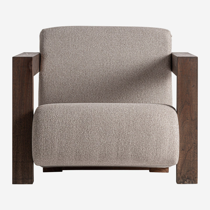 Sillón tapizado en poliéster en color crema