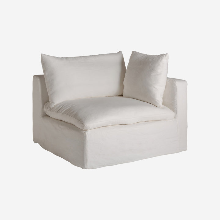 Sofá modular tapizado en lino en color blanco de inspiración art déco