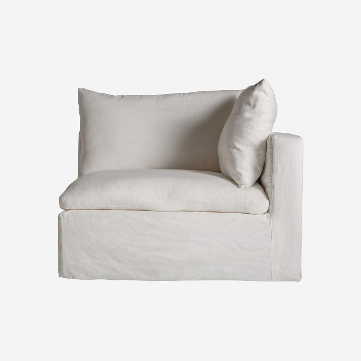 Sofá modular tapizado en lino en color blanco de inspiración art déco