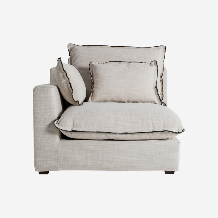 Sofá modular tapizado en poliéster en color blanco roto de estilo clásico