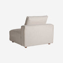 Sofá modular tapizado en poliéster en color crema de líneas contemporáneas