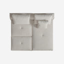 Sofá modular tapizado en poliéster en color crema de líneas contemporáneas