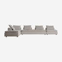 Sofá modular tapizado en poliéster en color gris de respaldo bajo