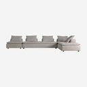 Sofá modular tapizado en poliéster en color gris de respaldo bajo