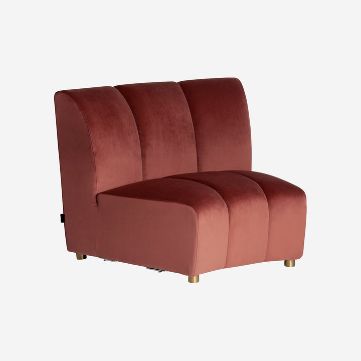 Sofá modular tapizado en terciopelo en color rosa