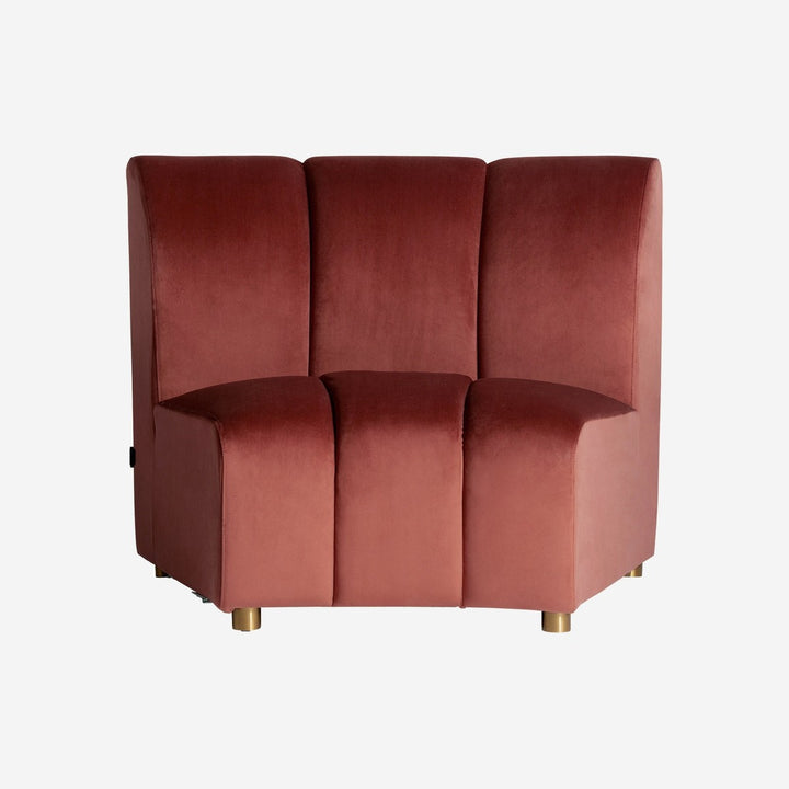 Sofá modular tapizado en terciopelo en color rosa