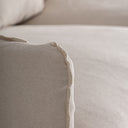 Sofá tapizado en lino en color beige 216 x 90 x 93 cm – detalle