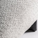 Sofá tapizado en poliéster en color blanco y negro jaspeado – detalle