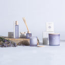 Vela aromática en color morado (pack de 6) – detalle