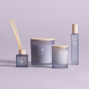Vela aromática en color morado (pack de 6) – detalle