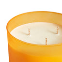 Vela aromática en color naranja (pack de 4) – detalle