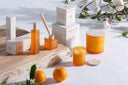 Vela aromática en color naranja (pack de 6) – detalle