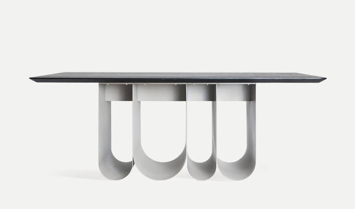 ARQA dining table with architectural design