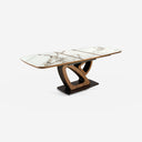 Mesa comedor extensible ovalada barril mármol porcelánico y nogal sobre fondo gris de estudio