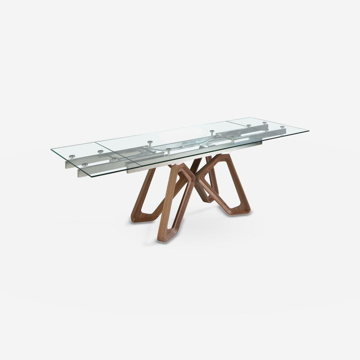 Mesa comedor extensible rectangular cristal templado y nogal sobre fondo gris de estudio