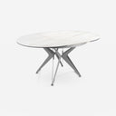 Mesa comedor extensible redonda mármol porcelánico y acero gris sobre fondo gris de estudio