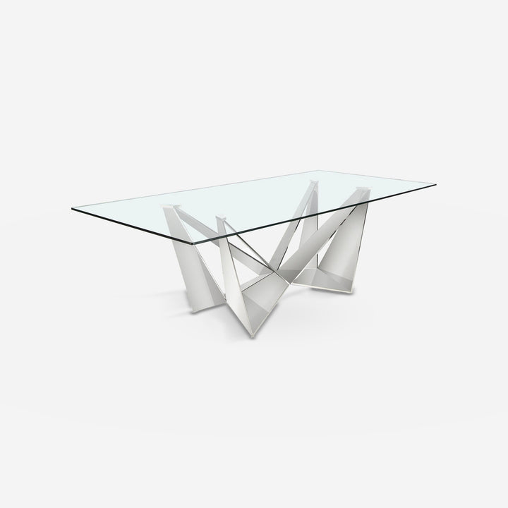 Mesa comedor rectangular cristal templado y acero cromado sobre fondo gris de estudio