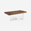 Mesa comedor rectangular nogal y cristal templado sobre fondo gris de estudio
