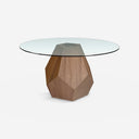 Mesa comedor redonda cristal templado y nogal sobre fondo gris de estudio