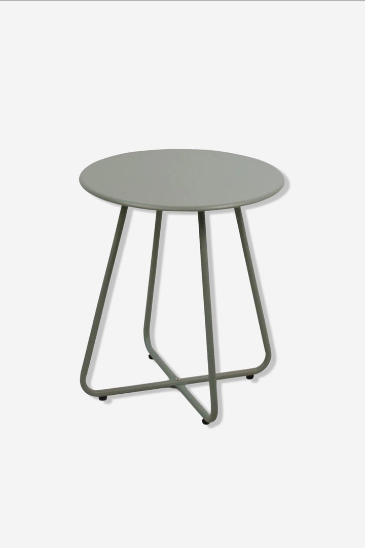Mesa Lucca verde Ø45 sobre fondo gris de estudio