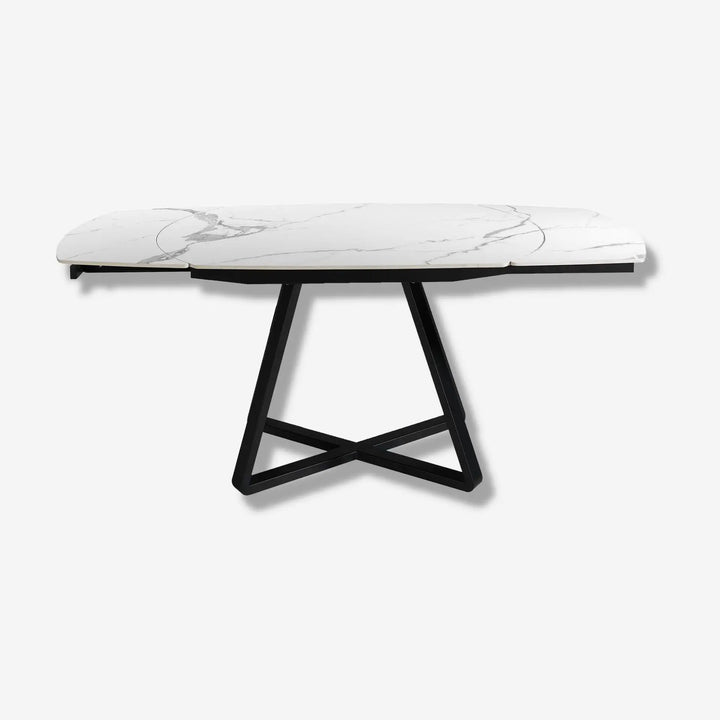 Mesa comedor extensible ovalada barril mármol porcelánico y acero negro