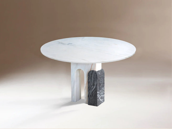 mesa de comedor redonda de marmol blanco y negro dovain studio 