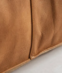 Puf BOUSSAC en color marrón, de cuero